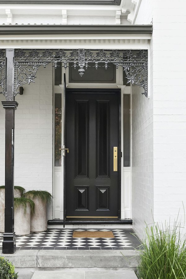 How Can You Create a Functional Entryway in a Home Without a Foyer?